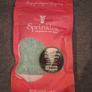 Pink Zebra Sprinkles in Red and Green Packaging